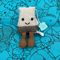 Porte-clés en forme de sachet de thé avec étiquette