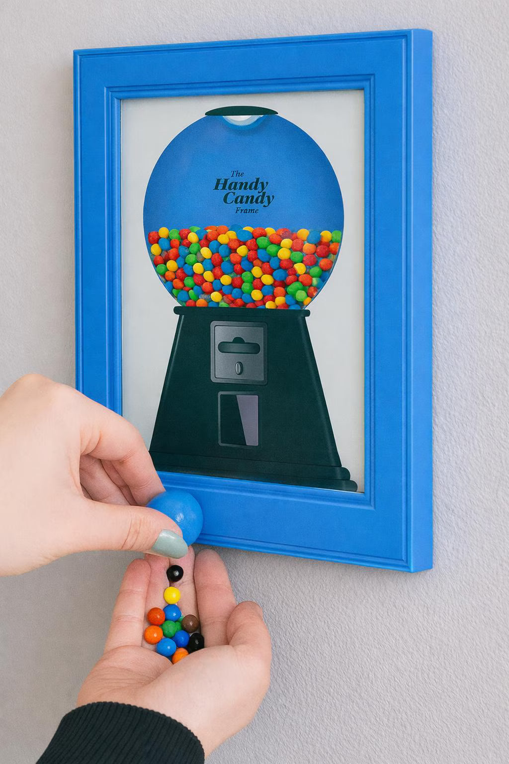 Cadre mural en forme de distributeur de bonbons
